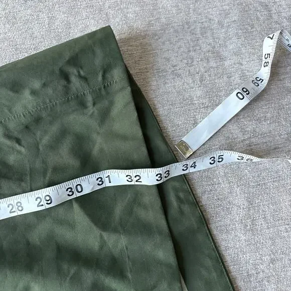 $450 QOR Women’s Green Technical Rain Jacket - Picture 6 of 7